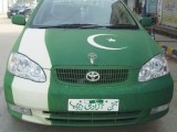 Green Car with flag on 14 August